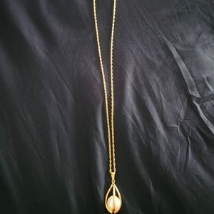 Long goldtone faux pearl necklace